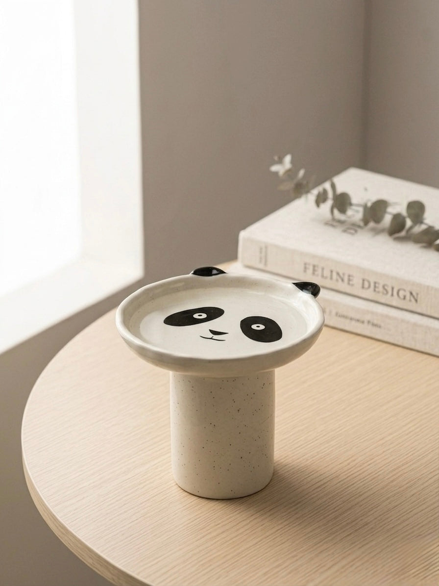 Boro Bowl with hand-painted black panda face, elevated speckled ceramic base